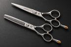 Ichiro Crown left-handed cutting and thinning scissors on a matte charcoal surface