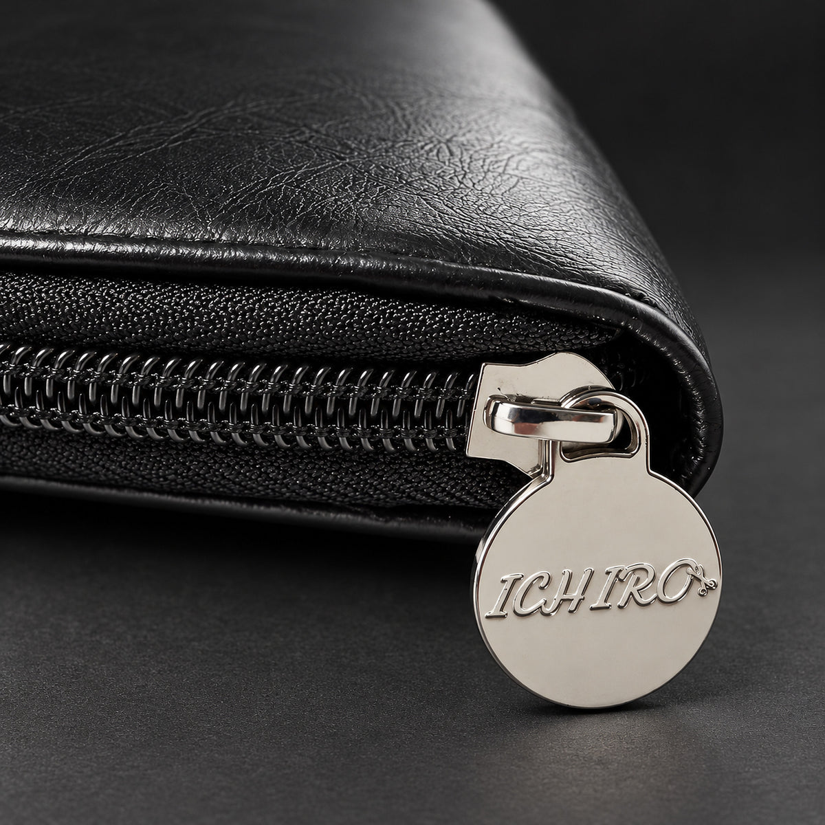 Ichiro-engraved zip pull on the black hairdressing scissor travel case