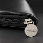 Ichiro-engraved zip pull on the black hairdressing scissor travel case